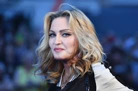 Madonna's official web site and fan club, featuring news, photos, concert tickets, merchandise, and more. Madonna Poses Topless In Nothing But Jewelry