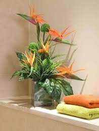 Birds Of Paradise And Alliums In A Glass Cube Rtfact Artificial Silk Flower Fake Flower Arrangements Large Flower Arrangements Tropical Floral Arrangements