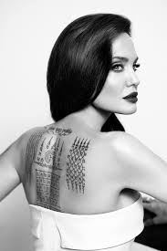 Angelina jolie is a famous actress with a serious love for tattoos, she's regularly featured in celebrity news magazines and websites with one of her new tattoo designs. Angelina Jolie Tattoos Parfum Und Brad Pitt Im Vogue Interview Vogue Germany