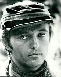 Sharing the spotlight with a larger-than-life father requires some  fortitude. Right there with Patrick Wayne, sharing the spotlight and trying  to climb out of the shadow of a legend, was the son