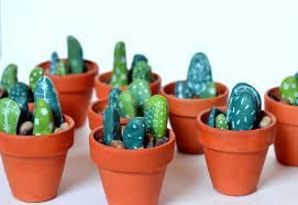 Select a few different green colors for all lines drawn inside the cactus. Easy To Make Painted Rock Cactus Centerpieces