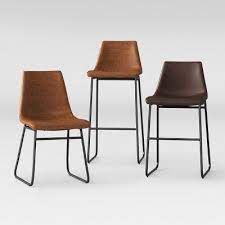 I really like these west elm chairs. Bowden Faux Leather And Metal Dining Chair Caramel Project 62 In 2021 Metal Dining Chairs Leather Counter Stools Leather Dining Chairs