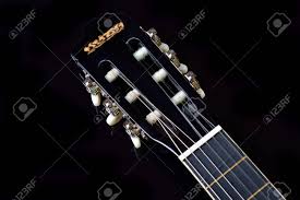 Guitar tuna is great for beginning musicians who aren't comfortable tuning with a chromatic tuner. Head Of An Acoustic Guitar With Tuning Machine Heads And Tuning Pegs Stock Photo Picture And Royalty Free Image Image 34634235