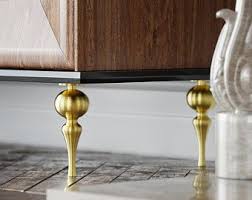 Set Of 4 Brass Cabinet Legs Brass Furniture Legs Metal Bench Etsy In 2020 Replacement Furniture Legs Furniture Legs Brass Furniture Legs