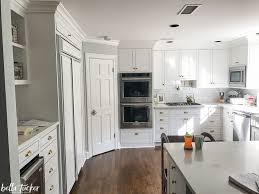 Kitchen cabinets white top black bottom. Blue And White Two Toned Kitchen Cabinets Bella Tucker