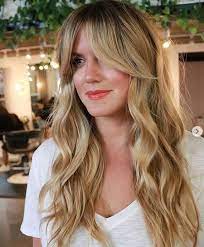 The Razored Layers Haircut Long Layered Hair Haircuts For Wavy Hair Haircuts For Long Hair