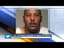Three Milwaukee County jail staff members charged in dehydration death of  inmate Terrill Thomas
