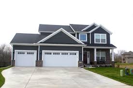 Check spelling or type a new query. White Trim Royal Ironstone Dark Grey Siding And Shakes White Carriage Style Garage Doors Certainteed Moire Black Roof In Downs Il Carlson Exteriors Inc