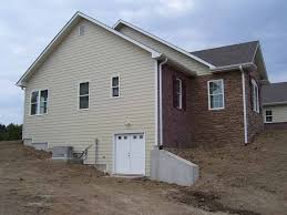 Check spelling or type a new query. Walk Out Basement With Concrete Retaining Wall Walkout Basement Custom Homes Basement Exterior