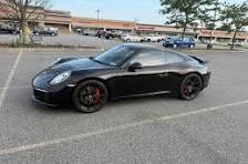 How would gold wheels look on a black Porsche 911?