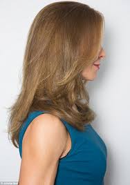 Having a drab, pale brown color: Mousy Hair S Just Got Screamingly Fashionable As Exemplified By Taylor Swift Daily Mail Online