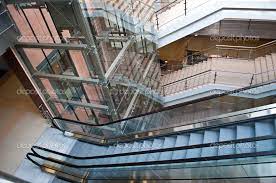If you think you don't have the space to install residential elevator in your home, we just may have the solution for you. Glass Elevator Shafts Escalators And Stairs In A Modern Office Building