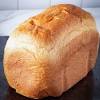 Arrange pepperoni, mozzarella cheese and parmesan cheese over the dough. 1