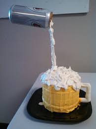 A beer can cake decorated with actual cupcakes and candles! Pouring Beer Mug Cake Theblondelawyer