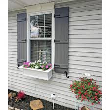 Homeadvisor's exterior shutter cost guide gives prices for house shutters, exterior rolling installing exterior shutters on a single window costs between $302 and $1,030 or $664 on average. Ekena Millwork Lj4s14x05500bl 14 W X 55 H Lifetime Vinyl Standard Four Board Joined Board N Batten Shutters W Installation Shutter Lok S Matching Screws Per Pair Black