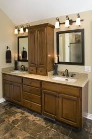 Those trendy solid wood vanity units for bathrooms are classic enough to remain on trend with the passing of the years. Double Sink Bathroom Vanity With Linen Tower Artcomcrea