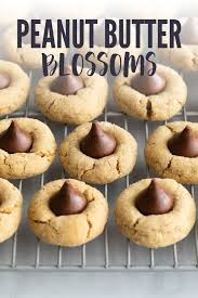 Melt In Your Mouth Peanut Butter Blossoms Peanut Butter Peanut Butter Blossoms Cookies Recipes Chocolate Chip