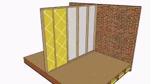 A double row of studs, one along each interior side. How To Soundproof A Stud Wall Youtube