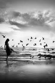 A Girl Walking On The Beach Photo Pictures White Photography