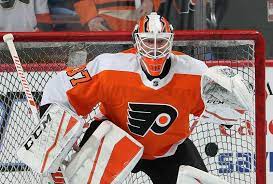 Philadelphia Pa April 05 Brian Elliott 37 Of The Philadelphia Flyers Prepares For A Shot During Warmup Carter Hart Carolina Hurricanes Philadelphia Flyers