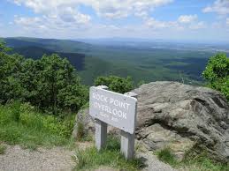 Blue ridge mountains in early morning panorama the early morning autumn sun breaks over the mountains in shenandoah national park bringing out the brilliant reds and oranges of the deciduous trees. Blue Ridge Parkway North Entrance Lyh Lynchburg Tourism