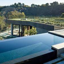 A swimming pool, swimming bath, wading pool, paddling pool, or simply pool is a structure designed to hold water to enable swimming or other leisure activities. 11 Of The Best Rooftop Swimming Pools On Dezeen
