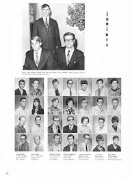 Junior class officers seated from left are Harold Coe, senator, Dennis  Carroll, senator and standing, Jack Arbaugh, president. R