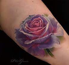 Check out our purple rose tattoo selection for the very best in unique or custom, handmade pieces from our tattooing shops. Pink And Purple Rose Simple Tattoos For Guys Purple Rose Tattoos Realistic Rose Tattoo