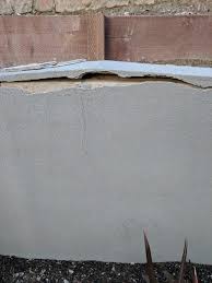 To apply stucco to your existing brick, block, or concrete wall, first, brush a concrete bonding agent onto the wall, then allow it to dry completely. Stucco Over Cinder Block Is Separated From The Wall