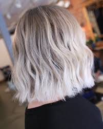 Wear with a cat eye and classic red lip for a dramatic beauty statement. White Blonde Balayage Short Hair Balayage Kurze Haare Blond Balayage Platinblond Haarfarbe