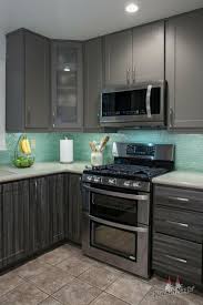 5 Reasons Why Kitchen Designers Love Glass Backsplashes Beautiful Kitchen Cabinets Kitchen Design Kitchen Furniture Design