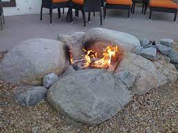 Natural stone fire pit for a more rustic looking fire pit, use flat natural stones to create a fire ring. I Like This Natural Fire Setting Natural Fire Pit Fire Pit With Rocks Fire Pit Backyard