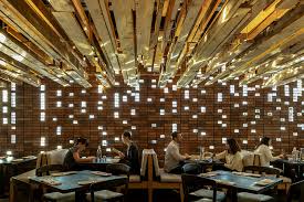 Viridis design studio evokes luxurious and dramatic design transforming outdated spaces into sleek and functional residences or businesses. Uchi Tres Birds