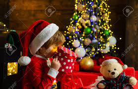 7.5' king flock® slim artificial christmas tree with 500 warm white led lights. Santa Boy Celebrate Christmas At Home Boy Child Play Christmas Decorations Merry And Bright Christmas Childhood Activity And Game Christmas Attributes Childhood Memories Family Holiday Stock Photo Picture And Royalty Free Image