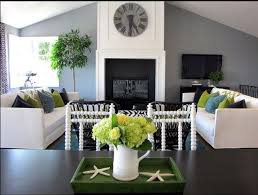 South facing rooms or any rooms that get plenty of natural light will notice the paint color tends to be a soft, warm gray with the absence of green undertones that are generally super common in a greige. Colors That Go With Gray And How To Decorate With Gray