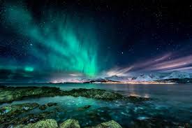 The northern lights, or aurora borealis, are natural lights that glow and flicker and sway in the sky in the upper part of the northern hemisphere at night. Where To See The Northern Lights Before Winter Ends