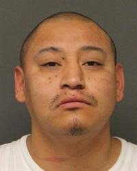 Suspect who allegedly assaulted officer and triggered manhunt turns himself  in