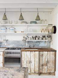 Using a small brush, add more antiquing glaze to the distressed parts of the cabinets and doors. 35 Best Farmhouse Kitchen Cabinet Ideas And Designs For 2021