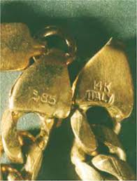 Close to this stamp is the manufacturer's stamp, which further clarifies genuine gold jewelry. Italian 14k Gold Mark Forged On Gold Jewelry
