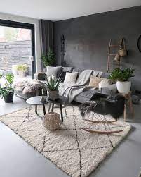 Nordic Style Living Room With White Geometric Rug Grey Sofa Plants And Cushions Nordic Style Living Room Living Room Warm Warm Living Room Design
