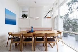 Early 20th century art deco scandinavian dining room tables. Scandinavian Style Dining Room With A Pendant Lighting A 10 Seater Wooden Dining Set And Glaz Minimalist Dining Room Dining Room Small Dark Wood Dining Table