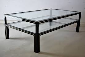 Some scratching on one edge of the the table. Hollywood Regency Two Tier Black Coffee Table By Pierre Vandel 1980s For Sale At Pamono
