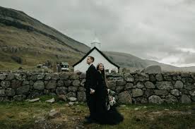 Cutting the cake was an important part of the reception. Mango Street Sweethearts Rachel Daniel S Moody Elopement On The Faroe Islands Green Wedding Shoes