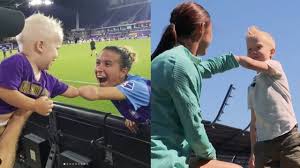 Soccer player reunites with fan years after viral elbow bump photo