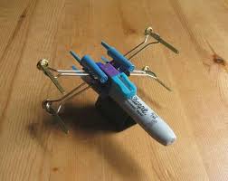 How To Make An X Wing Fighter From Office Supplies Star Wars Office Supplies Star Wars Office Star Wars Crafts