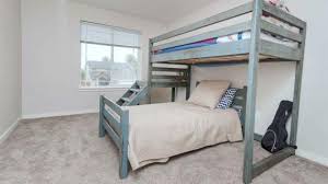 The easiest way to cut the angle for the support beams on the slide is to hold it up to the loft bed. Bunk Bed Ana White