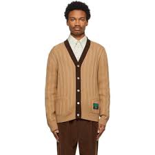 Tan knit camel hair cardigan with ribbed trim and gilt buttons from chanel dating to the 1980's. Gucci Beige Rib Knit Wool Gucci Label Cardigan Editorialist