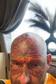 Image result for quirky pylon forehead tattoo