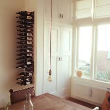 Designed in san francisco, by 2012 icff winning designer, eric pfeiffer. Stact Modular Wine Wall Rack Design Is This