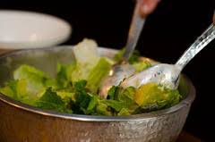 The classic caesar salad, too, is prepared according to tradition, tableside and with gusto. Tableside Definition And Meaning